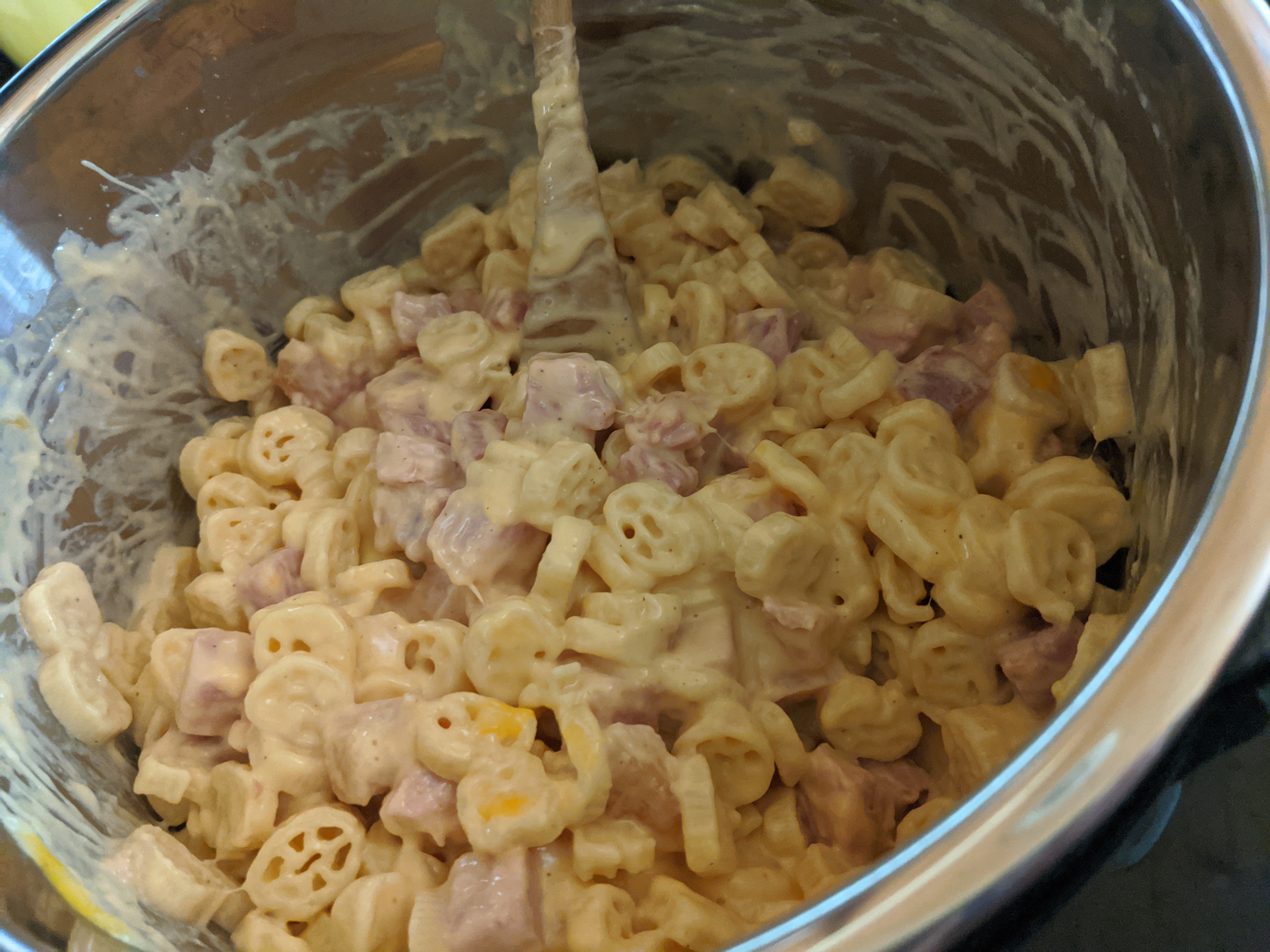 Budget friendly ham and cheese pasta made in the pampered chef quick cooker